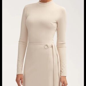 Brand new veiled dress in stone.